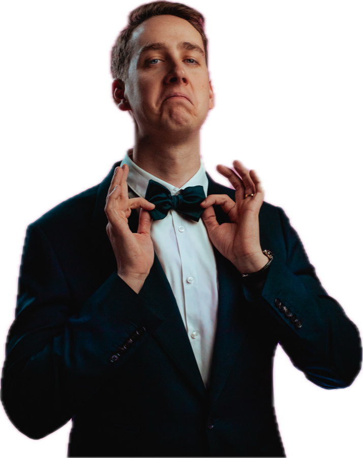 Sebastjan Oblak, founder of Squareme, in a tuxedo adjusting his bow tie